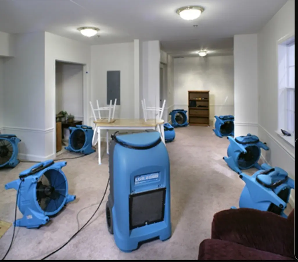 Air movers and dehumidifier setup for Water Damage Restoration in Devils Lake